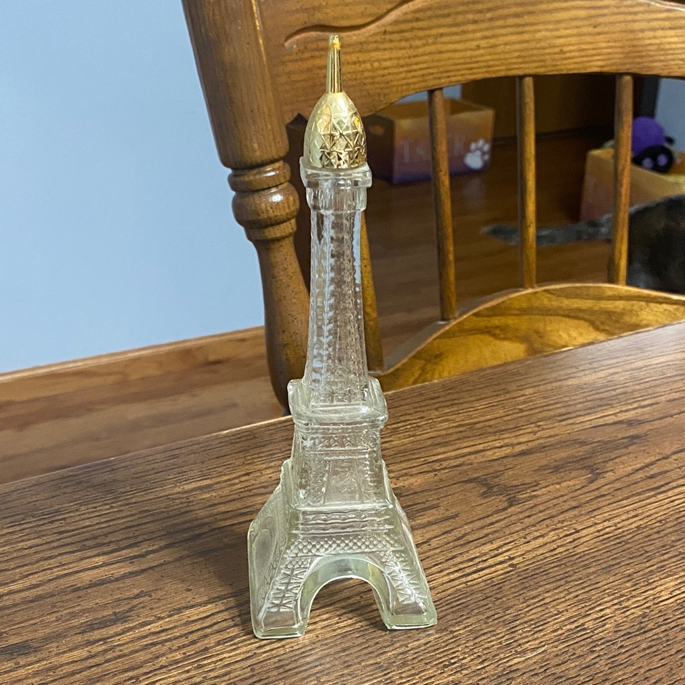 Avon Eiffel Tower glass bottle with golden plastic screw off top